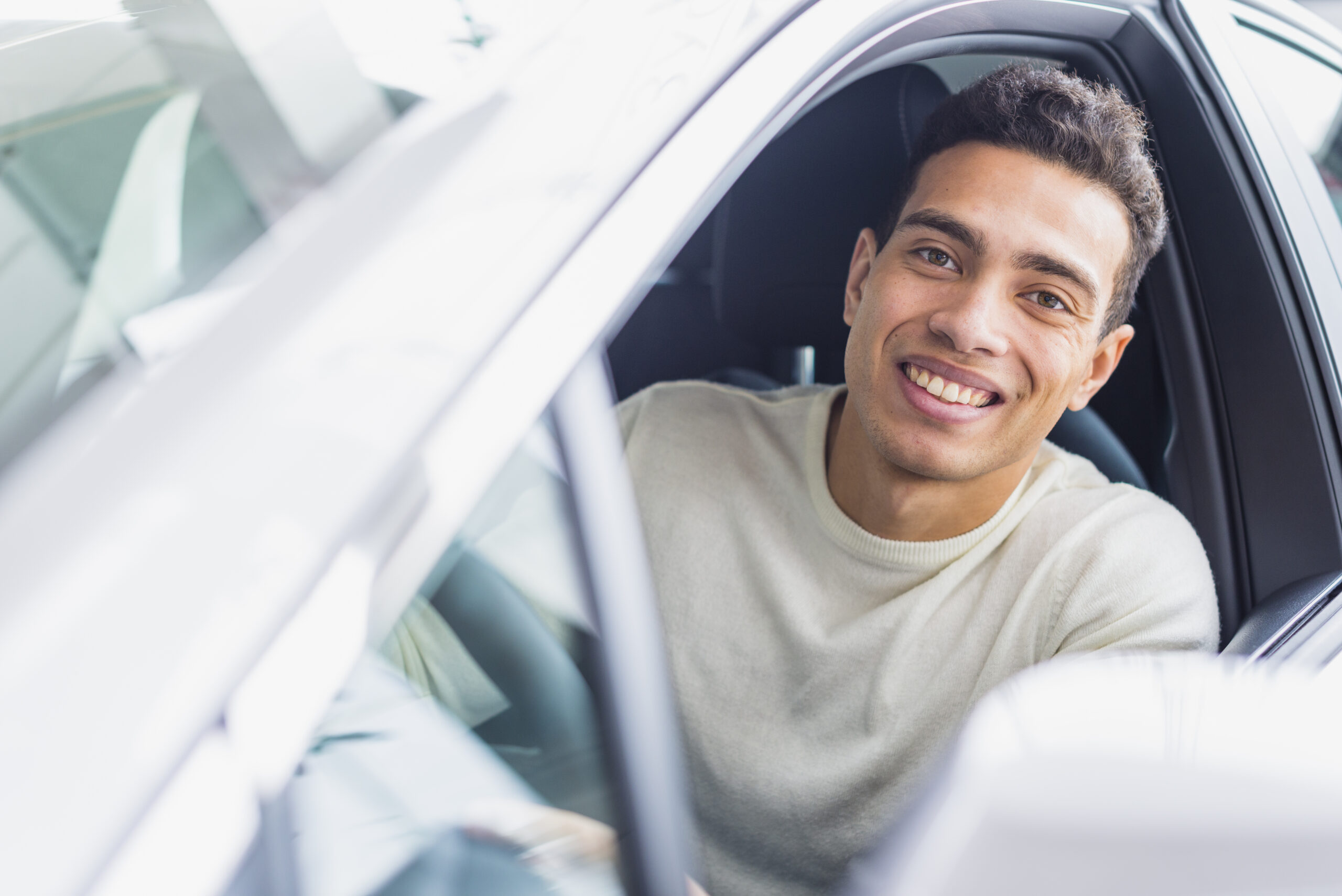 happy-man-car-dealership
